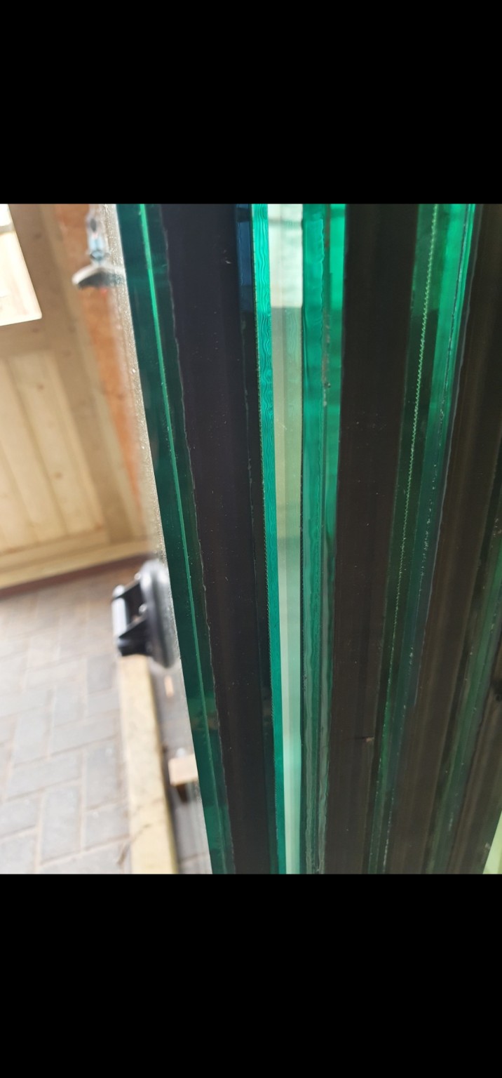 Detail van de opbouw van gelaagd glas